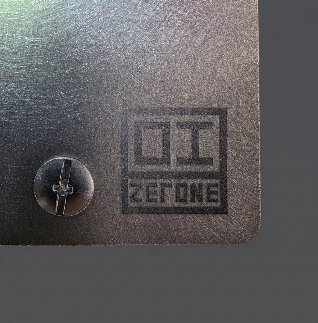 ZERONE Brushed plate – engraved logo detail in Grade 2 titanium