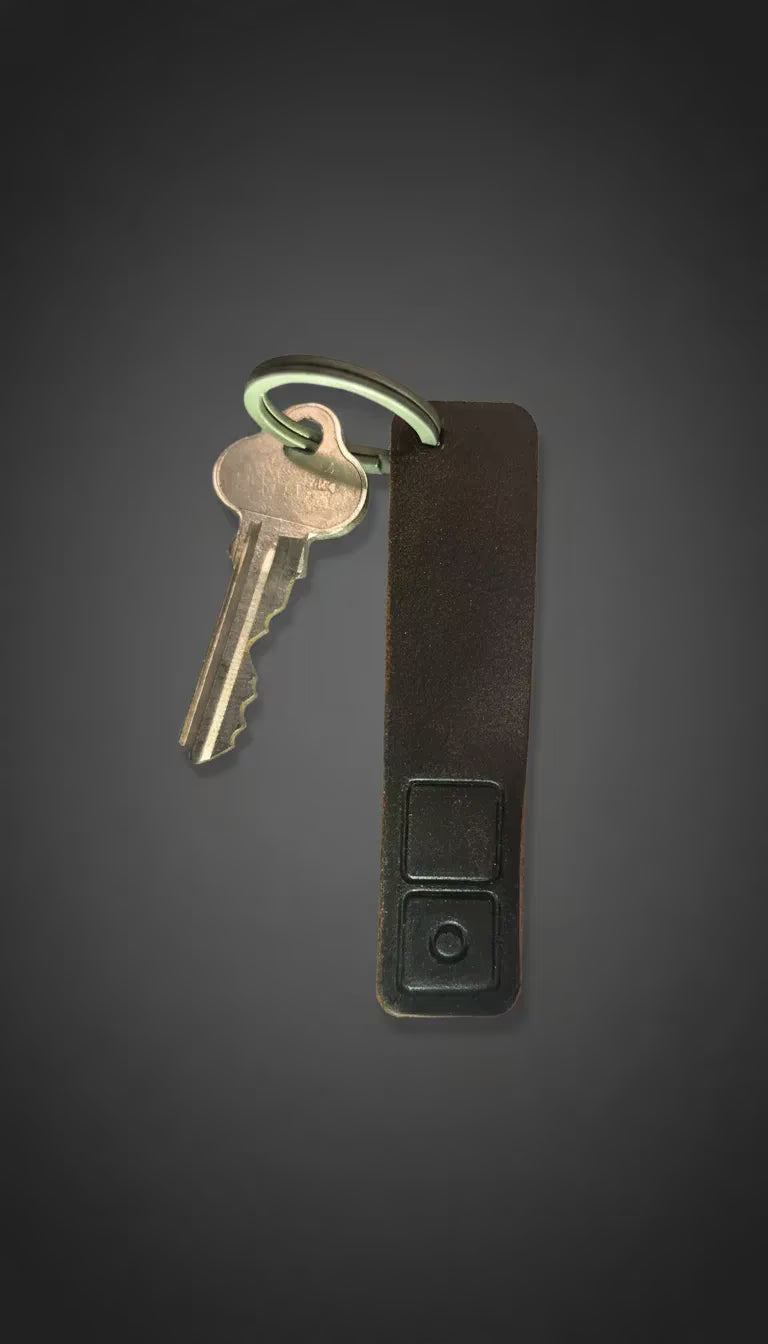ZERONE artisan key fob – leather stitching and titanium ring detail