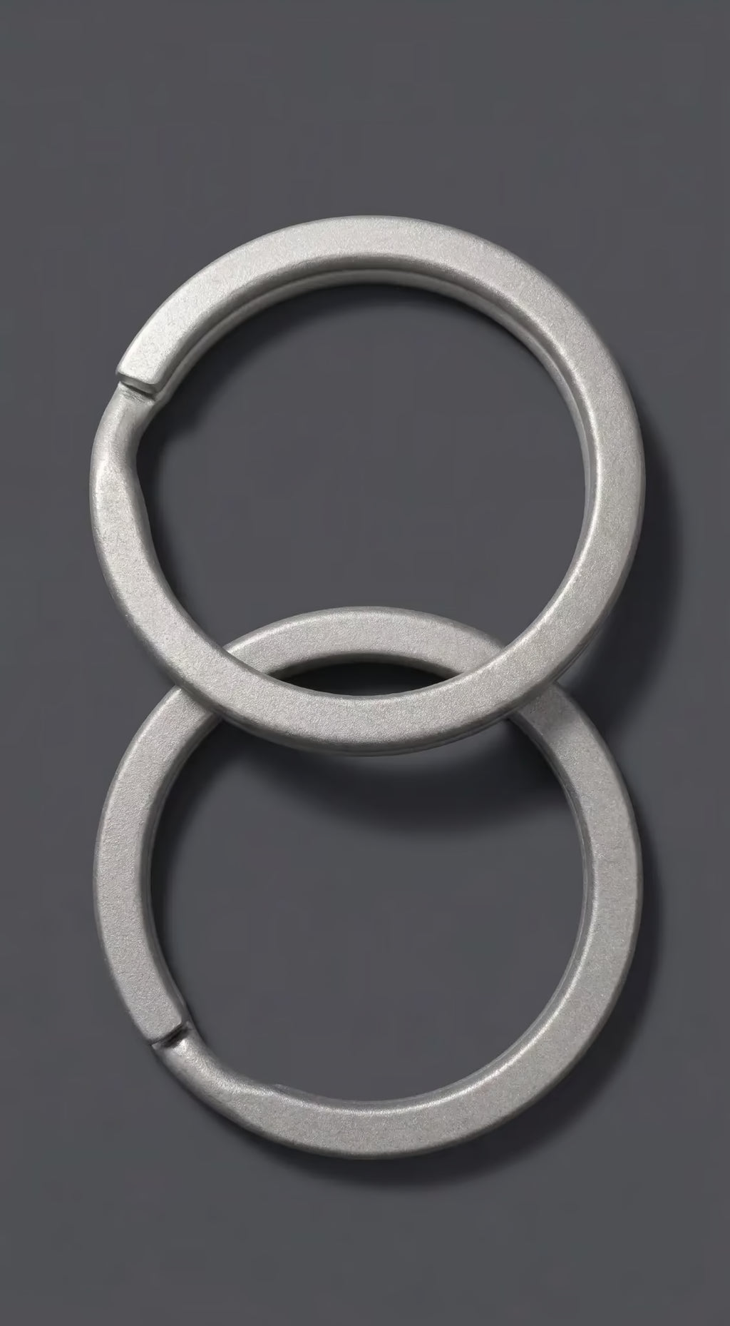 ZERONE titanium keyrings – set of 2 stacked high resolution
