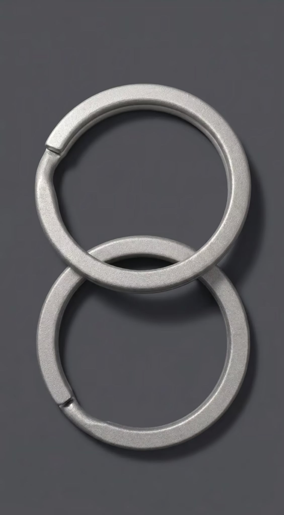 ZERONE titanium keyrings – set of 2 stacked high resolution