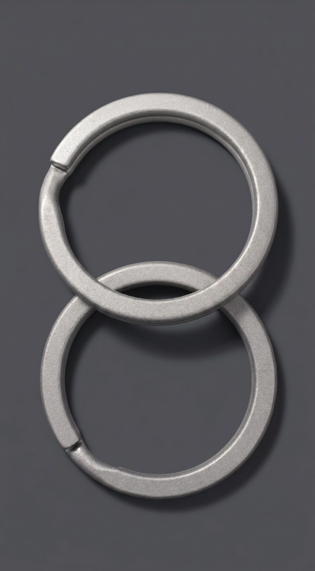ZERONE titanium keyrings – set of 2 stacked high resolution