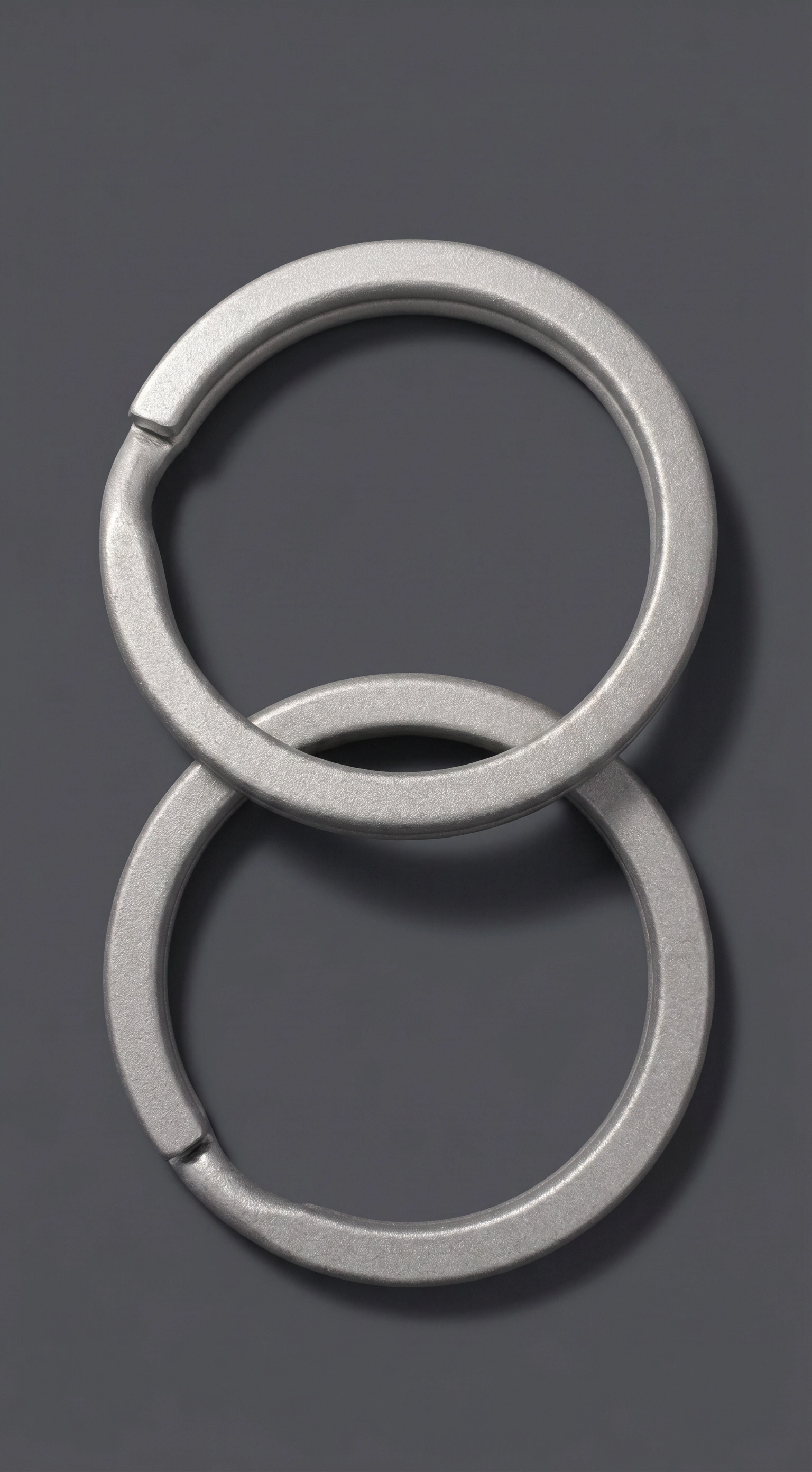ZERONE titanium keyrings – set of 2 stacked high resolution