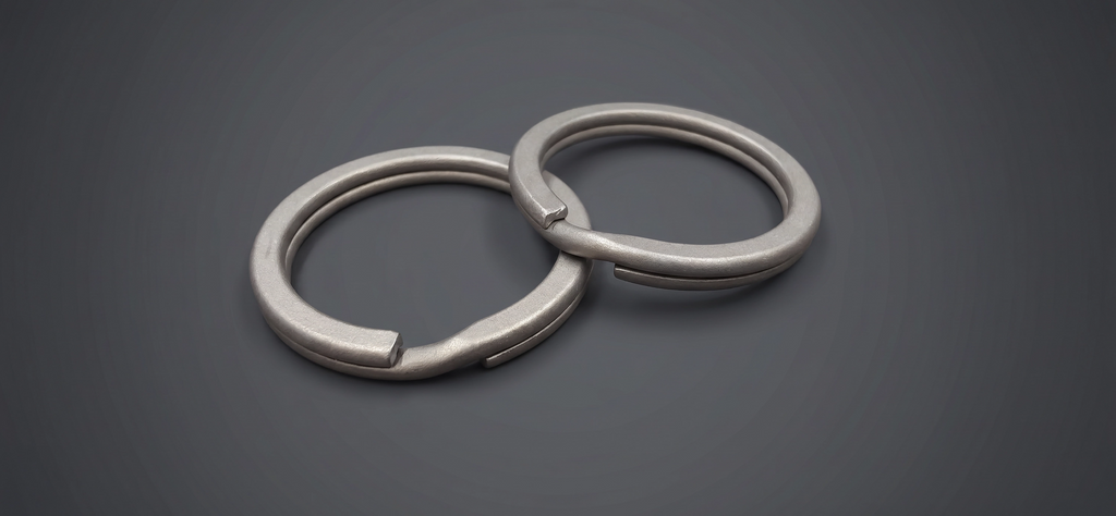 ZERONE titanium keyrings – set of 2 front view
